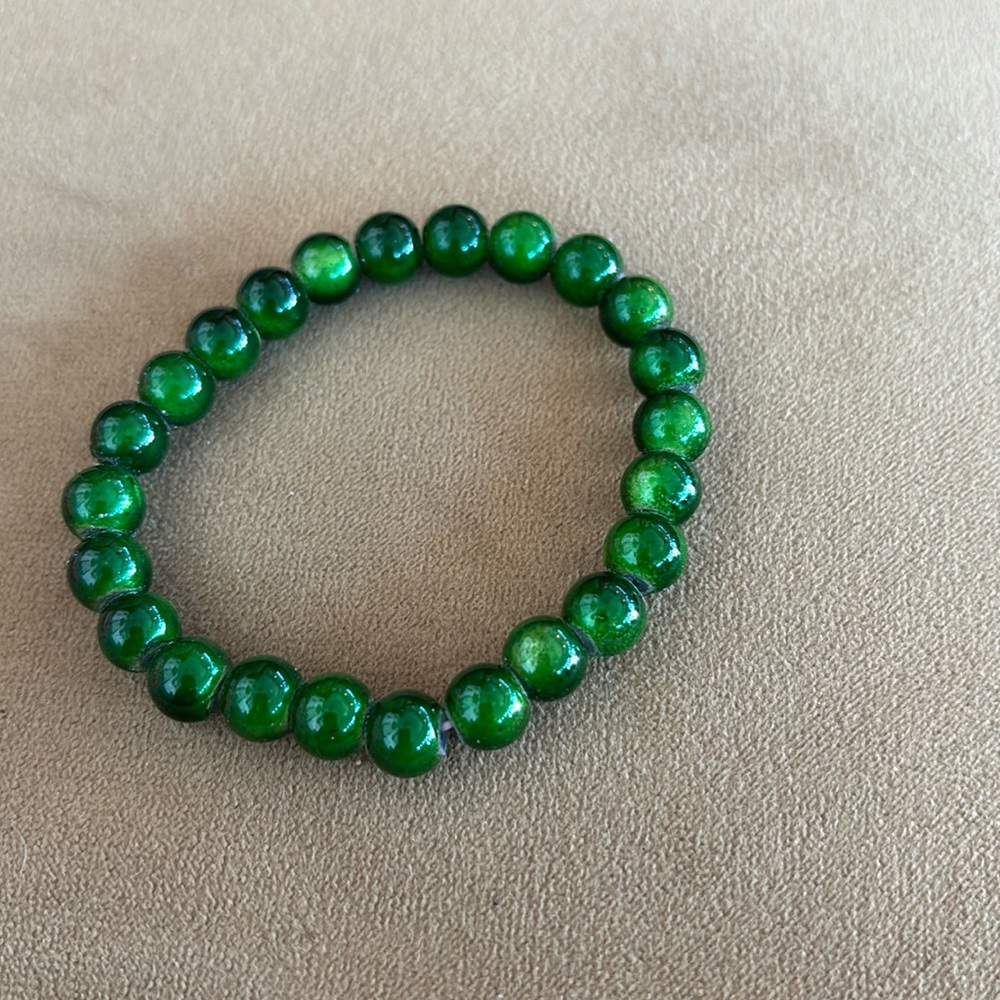 Red or green Miracle bracelets $10 each or two for $18